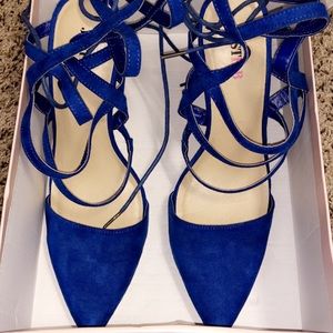 Cobalt blue lace-up caged pumps